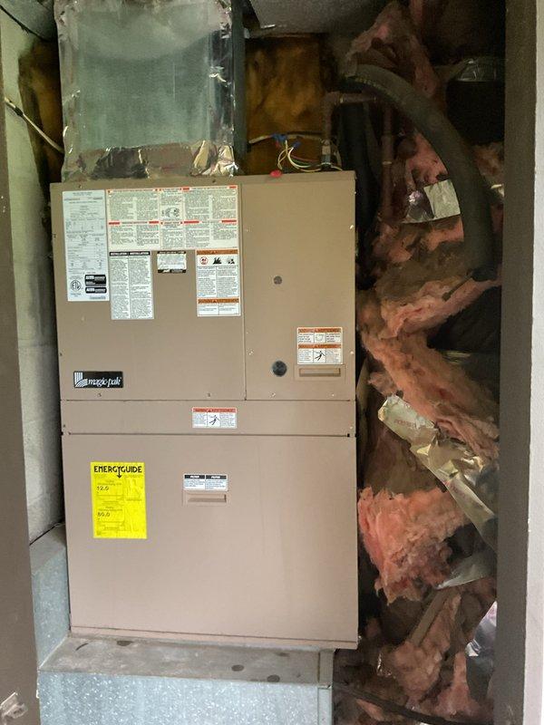 Completed BS-MVP cooling maintenance visit on 5-year-old air conditioning system. Performed standard preventive maintenance inspection of Macrojet HVAC unit including examination of blower assembly, electrical connections, capacitor, and control board components. Customer inquired about sourcing replacement for washable/reusable air filter, reporting difficulty locating correct size through standard retail channels. Documented system condition with photos of interior control panel showing wiring, motor assembly, and electrical components, as well as exterior unit installation in mechanical room. Advised customer that specialty filter can be ordered through supplier to match existing specifications.