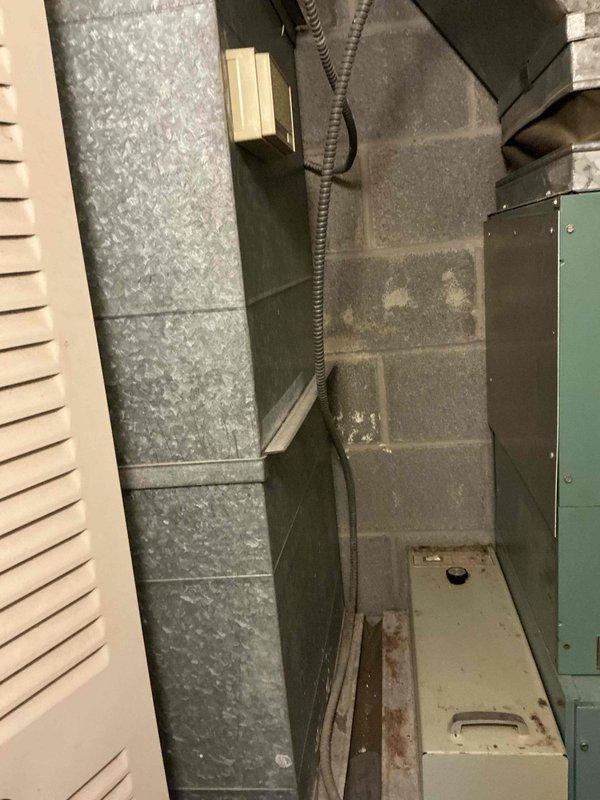 Conducted comprehensive HVAC estimate for complete system replacement including heat pump, furnace, and generator installation. Assessed existing mechanical room configuration with vertical ductwork and evaluated electrical panel capacity to determine requirements for new equipment integration and necessary electrical upgrades to support the proposed three-unit system installation.