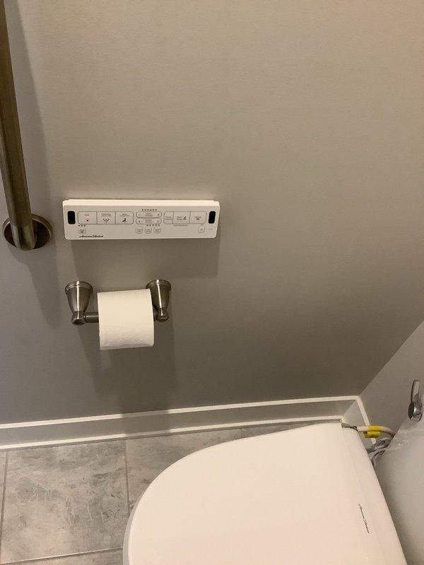 Installed American Standard Advanced Clean 2.5 SpaLet bidet seat on elongated chair height American Standard Cadet toilet. Connected dedicated electrical circuit to power heated seat and heated water features. Mounted wall control panel with programmable bidet functions and installed all components per manufacturer specifications.