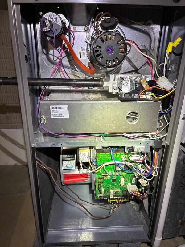 Completed scheduled maintenance inspection on 4-year-old Lennox furnace system as part of recurring MVP service agreement. Removed access panel and performed comprehensive visual inspection of all internal components including blower motor assembly, heat exchanger, burner assembly, and control board. Verified all electrical connections were secure with proper wire routing throughout the unit. Inspected control board for signs of wear or damage, confirmed all wire harnesses properly seated in terminals. Examined blower motor housing and mounting brackets for stability and proper operation. Assessed heat exchanger surface condition and verified integrity with no visible cracks or deterioration. Checked all safety labels and documentation remained legible and properly affixed. Verified ductwork connections at furnace plenum were secure with no air leakage. System operational and functioning within normal parameters upon completion of inspection.