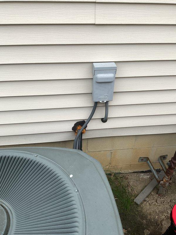 Completed routine maintenance on a 17-year-old air conditioning system and an 8-year-old gas furnace. Inspected outdoor condensing unit with electrical disconnect, verified proper operation of condenser fan motor and coil assembly, and cleaned accumulated debris from top-mounted fan assembly. All components found to be in functional condition with normal wear for equipment age.