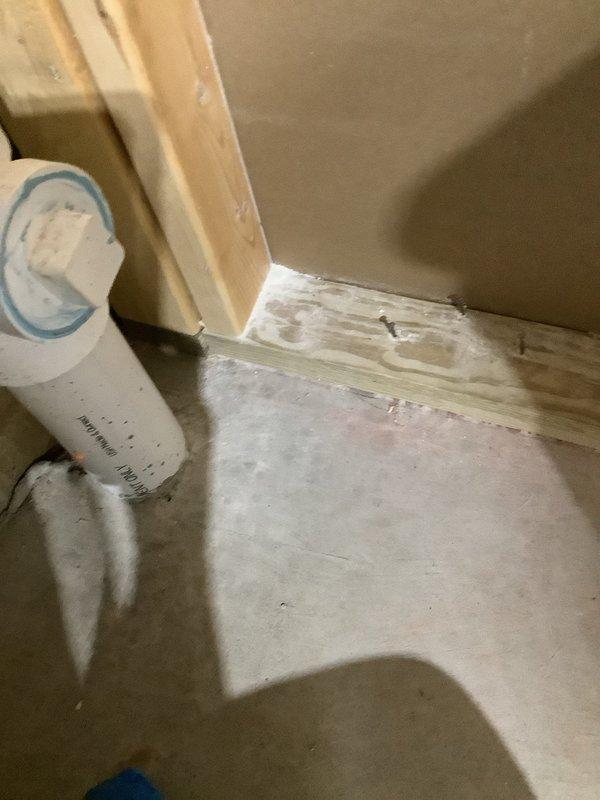 Provided quote for utility tub water and sewer hook-up installation in basement area. Assessed existing plumbing infrastructure, including vertical PVC drain line and connection points along concrete block wall. Evaluated rough-in requirements for proper drainage and water supply connections to accommodate new utility sink installation. Documented existing conditions with photos showing basement framing, concrete flooring, and current plumbing configuration to support accurate quote preparation.