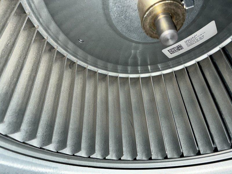 Completed MVP cooling tune-up on 14-year-old air conditioning system. Performed comprehensive maintenance including inspection of blower wheel assembly, which showed typical dust and debris accumulation on squirrel cage fan blades and internal components. Cleaned blower wheel and utilized specialized duct cleaning brushes to remove buildup from system components, ensuring optimal airflow and efficiency for continued operation.