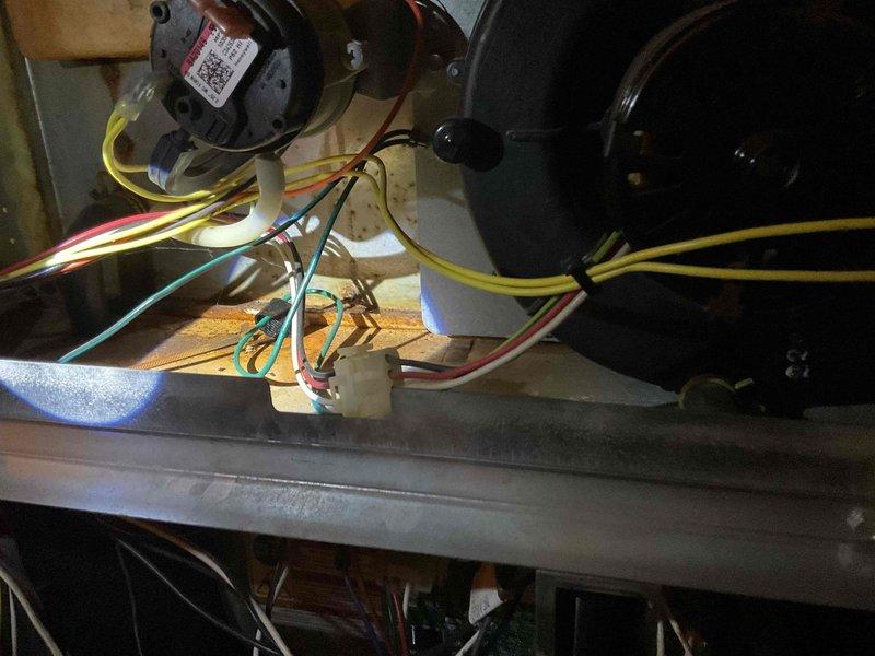 Completed comprehensive cooling tune-up on 6-year-old air conditioning system. Performed standard maintenance inspection including examination of blower motor assemblies, control board connections, and electrical wiring integrity. All components found to be functioning within normal operating parameters, with proper wire terminations at circuit board and motor connections verified. System operational and ready for cooling season.