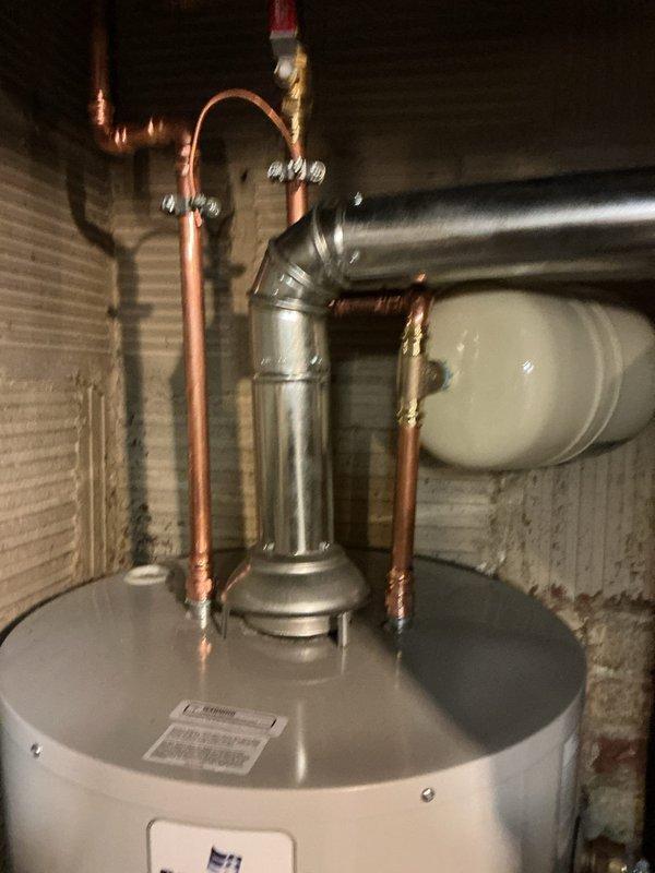 Installed new 40-gallon tall water heater with 10-year warranty, including complete plumbing connections with copper piping, pressure relief valve, and wall-mounted expansion tank. Installed new icemaker supply line to provide dedicated water connection for refrigerator ice maker. All components professionally staged, assembled, and tested to ensure proper operation and code compliance.