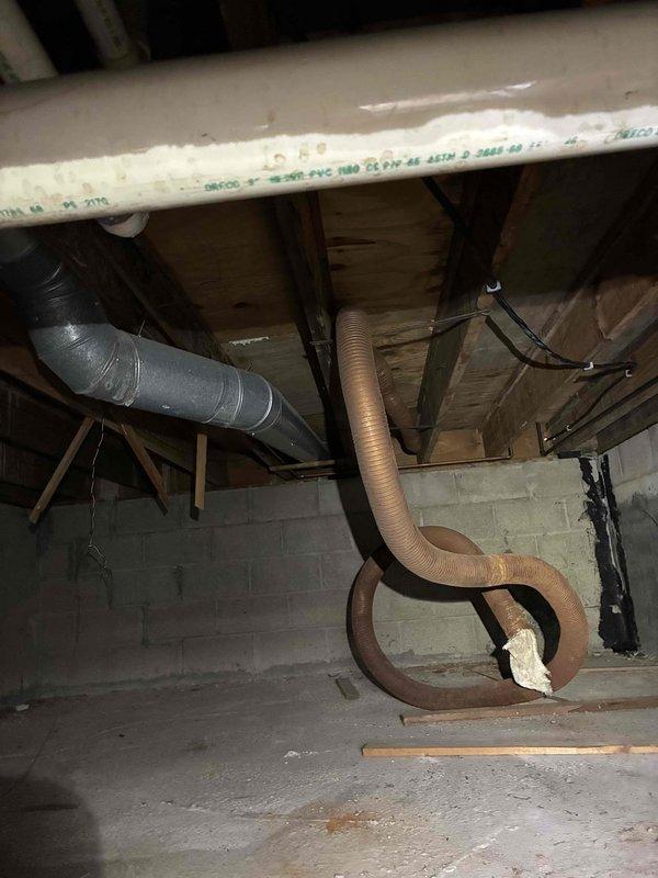 Installed a dedicated 60-amp circuit from the main electrical panel, routing through drop ceiling and crawlspace to the left corner of the garage for an electric vehicle charger installation. Removed an incompatible Eaton in-breaker surge protector from the Siemens panel and replaced it with an external whole-house surge protection device tied into existing high-amperage circuits. Installed a hardwired disconnect switch at the charger location per code requirements and upgraded the air conditioner circuit breaker to a 2-pole 45-amp unit. All necessary parts were sourced and the installation was completed with proper wire routing through existing infrastructure, ensuring code-compliant electrical service for the new charging equipment.
