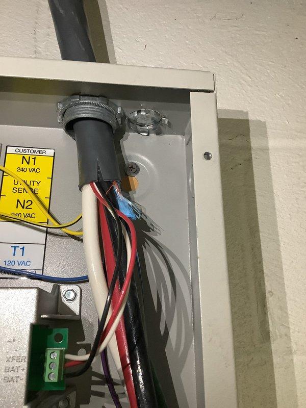 Responded to failed electrical inspection on transfer switch installation. Installed knockout filters in top of transfer switch enclosure to meet code requirements. Applied heat shrink tubing to all wire splices within transfer switch for proper insulation and listing compliance. Replaced green-colored phase conductor splice extensions with appropriate phase wire colors per NEC standards, ensuring ground and neutral conductors maintained proper color coding. Documented all corrections with photographs and uploaded to permit file for reinspection scheduling.