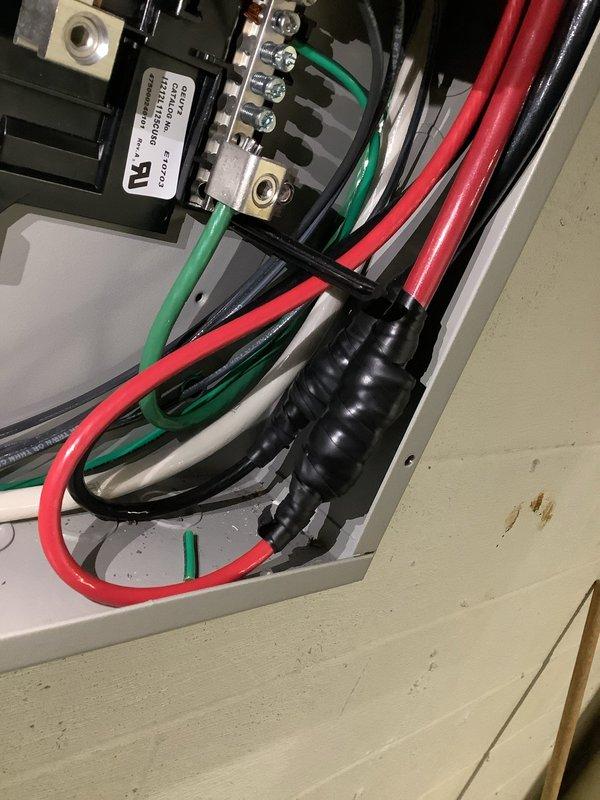Responded to failed electrical inspection on transfer switch installation. Installed knockout filters in top of transfer switch enclosure to meet code requirements. Applied heat shrink tubing to all wire splices within transfer switch for proper insulation and listing compliance. Replaced green-colored phase conductor splice extensions with appropriate phase wire colors per NEC standards, ensuring ground and neutral conductors maintained proper color coding. Documented all corrections with photographs and uploaded to permit file for reinspection scheduling.