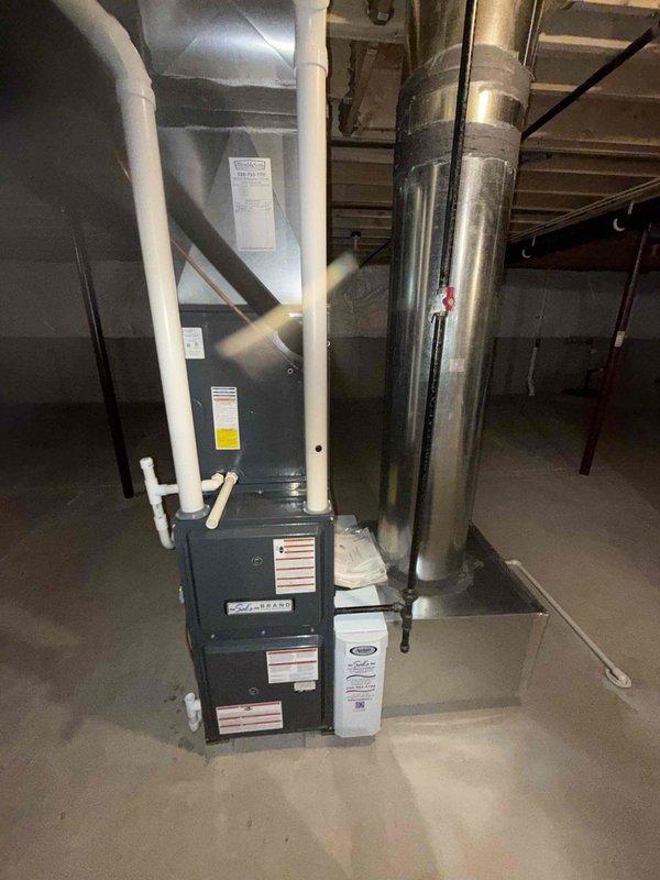 Completed scheduled MVP cooling maintenance on 4-year-old HVAC system. Performed comprehensive inspection of furnace unit and air conditioning components, including examination of multi-stage furnace with proper clearances for maintenance access. Inspected electrical control panel, verifying all wiring connections, circuit board functionality, and terminal blocks. Checked condensate drainage system and PVC piping for proper operation. Examined ductwork installation and metallic tape sealing integrity throughout distribution system. All components found operating within normal parameters with no issues identified requiring immediate attention.