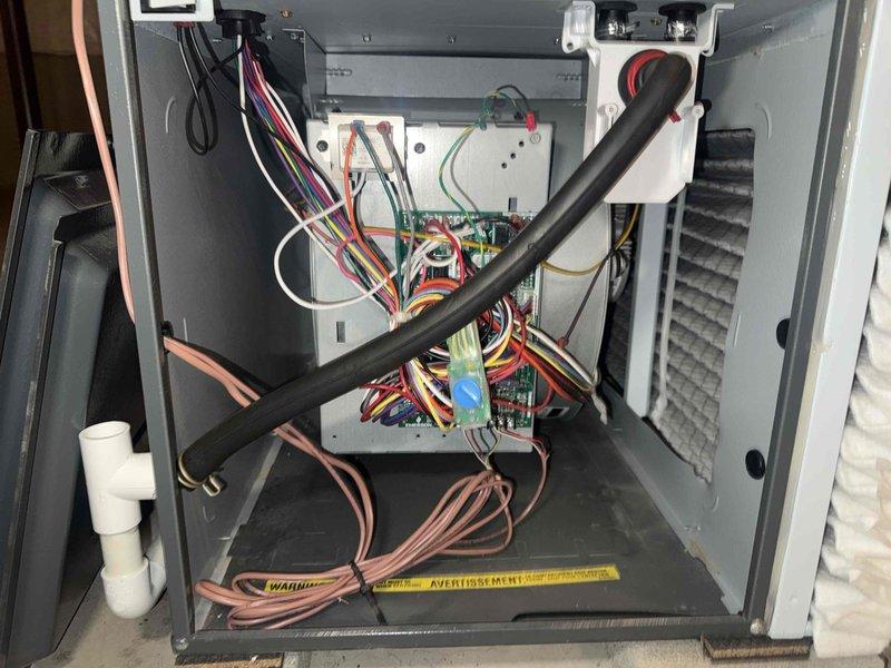 Completed scheduled MVP cooling maintenance on 4-year-old HVAC system. Performed comprehensive inspection of furnace unit and air conditioning components, including examination of multi-stage furnace with proper clearances for maintenance access. Inspected electrical control panel, verifying all wiring connections, circuit board functionality, and terminal blocks. Checked condensate drainage system and PVC piping for proper operation. Examined ductwork installation and metallic tape sealing integrity throughout distribution system. All components found operating within normal parameters with no issues identified requiring immediate attention.