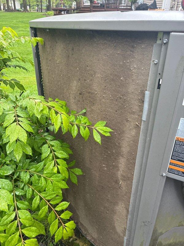 Performed cooling maintenance on residential HVAC system between 8:00 AM and 9:00 AM. Inspected outdoor condenser unit and replaced heavily soiled evaporator pad/filter media that had accumulated significant dust and debris, restricting proper airflow. Noted vegetation encroachment near unit intake requiring clearance for optimal system performance.