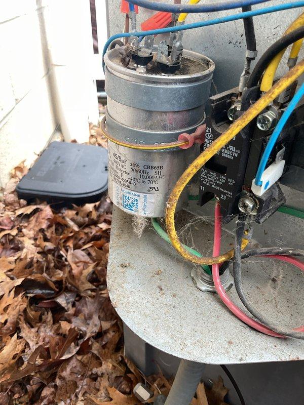 Completed seasonal tune-up on outdoor condensing unit, including capacitor inspection, electrical connection verification, and debris removal from equipment area. Unit tested and operating within normal parameters; all components functioning properly with no deficiencies noted.