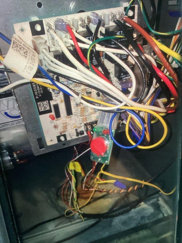 Completed comprehensive maintenance visit protocol on an 8-year-old residential air conditioning system. Performed thorough inspection of all major components including condensate drainage system, electrical control board, wiring connections, and refrigerant lines. Verified proper operation of all safety controls, relays, and monitoring devices. Inspected PVC condensate drain configuration for proper pitch and drainage, checked for moisture accumulation in air handler cabinet, and examined copper refrigerant line insulation. Evaluated control board connections and verified secure terminations of all color-coded wiring at terminal blocks. System operating within normal parameters upon completion of maintenance procedures.
