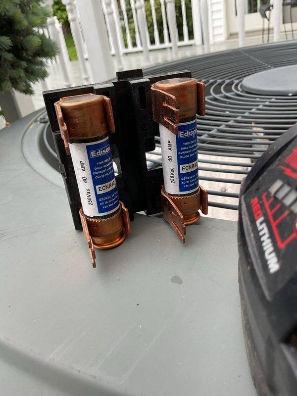 Completed comprehensive spring air conditioning tune-up and maintenance inspection on a seven-year-old system for MVP program member. Performed full system diagnostics including airflow measurements in ductwork (recorded 446 CFM), inspected and verified proper operation of 40-amp 250V Edison fuses in outdoor disconnect, checked electrical connections, and evaluated condenser unit performance. All components found operating within normal parameters with no deficiencies noted.
