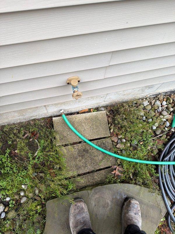 Responded to customer complaint of black particles appearing in bathtub and toilet water. Performed complimentary water quality testing to identify the source of contamination. Conducted exterior inspection at foundation-level hose bib and collected water samples using pressure gauge and testing equipment at utility sink location to analyze water quality and determine appropriate treatment recommendations.