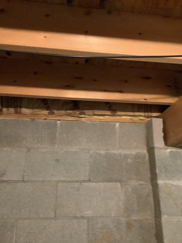 Completed electrical estimate and site assessment for car charging station installation project. Evaluated existing electrical infrastructure in basement area, including panel box condition and capacity for required upgrades. Assessed garage outlet configuration to determine necessary improvements for enhanced power distribution. Documented current wiring conditions, exposed floor joists, and electrical routing pathways through foundation areas. Identified structural access points and cable management requirements for future installation work. Provided comprehensive photographic documentation of basement panel location, existing utility runs, and foundation wall conditions to support accurate project planning and material specifications.