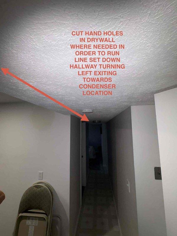 Completed comprehensive HVAC system replacement estimate for property with hail-damaged air conditioning unit and aging Rheem furnace requiring replacement. Assessed existing system configuration, documented current furnace dimensions and ductwork connections, and determined optimal installation pathway requiring hand-cut drywall access points along interior hallway to route new refrigerant line set from indoor unit location to exterior condenser placement.