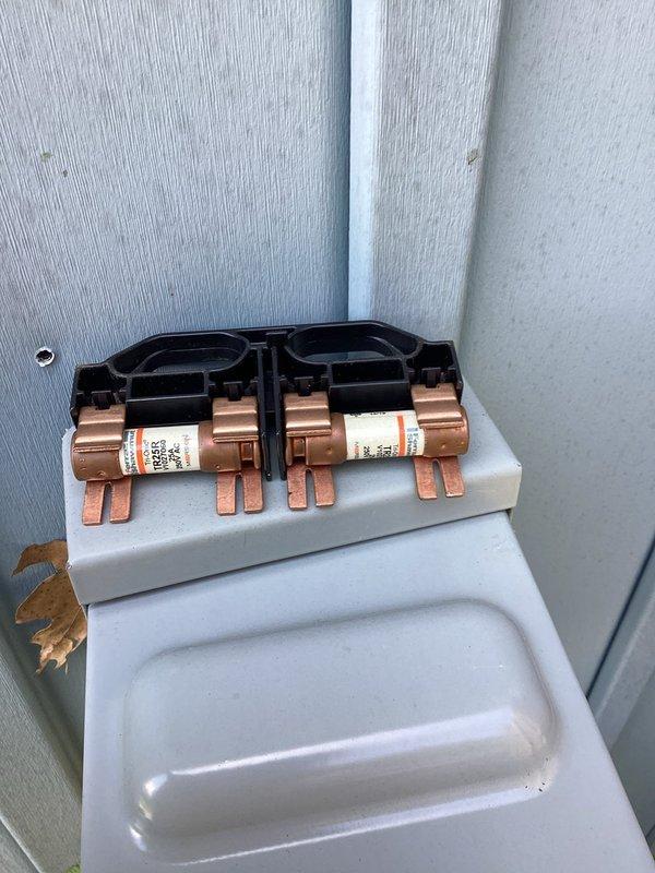 Completed MVP cooling maintenance visit on outdoor condensing unit. Connected refrigerant gauges to service ports to verify system pressures and performance, inspected electrical components including fuses in disconnect box, and performed standard preventative maintenance checks on all accessible components to ensure proper system operation for the cooling season.
