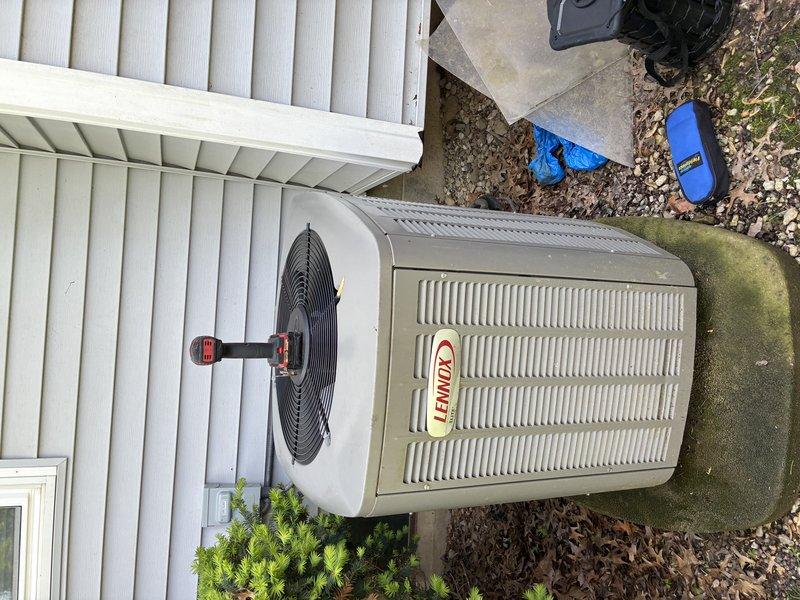 Completed comprehensive cooling system maintenance on eight-year-old Lennox air conditioning unit. Performed thorough inspection of blower assembly, confirming proper operation of fan wheel and motor components. Inspected condenser unit exterior, verified adequate clearance around equipment, and assessed overall system condition. Unit operating within normal parameters with no immediate service concerns identified.