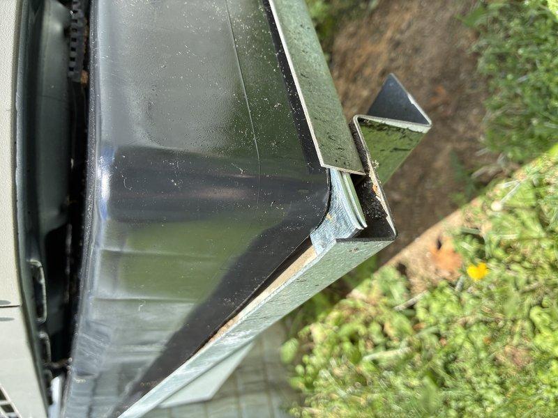 Responded to service call regarding outdoor condensing unit not sitting level following recent HVAC installation. Upon arrival, performed visual inspection of unit placement and verified installation on pad. Unit was found to be properly positioned and level on mounting platform. Documented equipment condition and placement with photos showing unit secured on decking with appropriate clearances maintained from structure and adequate ventilation access. No adjustments required as unit met manufacturer specifications for level installation.