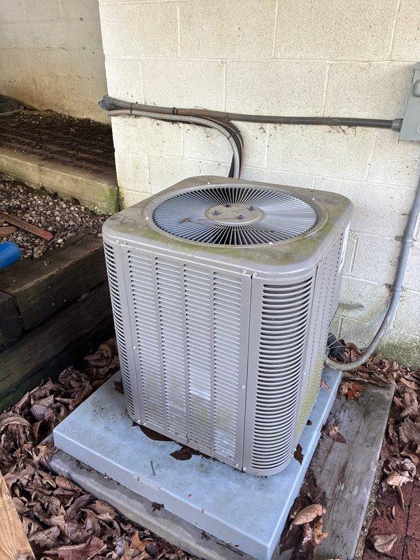 Completed preventive maintenance on a 5-year-old residential air conditioning system. Outdoor condenser unit exhibited moderate weathering with visible dirt accumulation, organic growth, and surface staining on cabinet exterior. Evaporator coil inspection revealed heavy dust and debris buildup throughout fins, indicating need for thorough cleaning. Assessed ductwork condition for potential cleaning requirements. Customer enrolled in monthly maintenance plan at time of service.