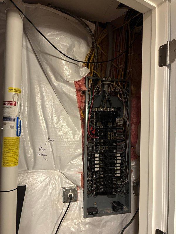 Installed dedicated 240V high-power circuit for water heater in utility closet, completing rough-in wiring and breaker panel integration. Routed appropriate gauge conductors through wall cavities with insulation present, terminated connections at main electrical panel with proper circuit protection, and established grounding per code requirements. All electrical work performed to ensure safe operation of water heating equipment.