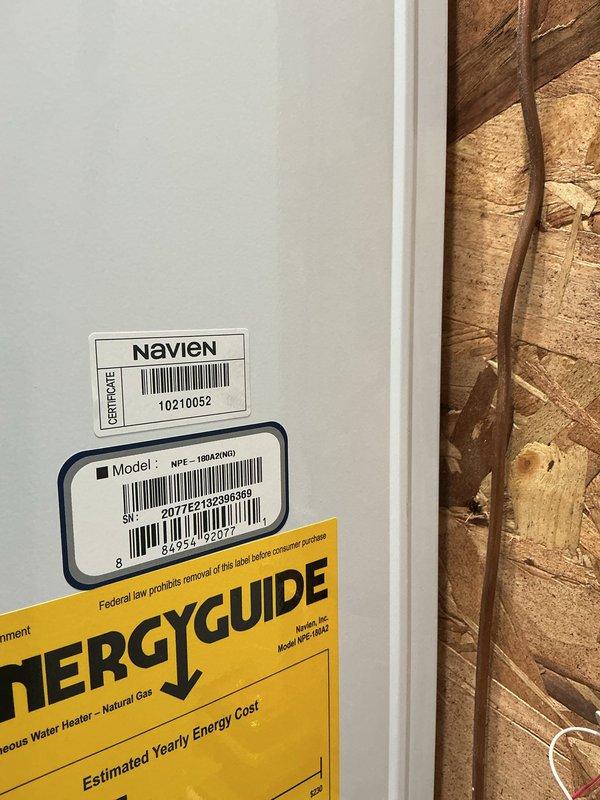 Performed routine maintenance descaling service on Navien NPE series tankless water heater unit. Flushed system with descaling solution to remove mineral buildup and sediment from heat exchanger, ensuring optimal performance and efficiency. Unit tested and confirmed operating within normal parameters upon completion.