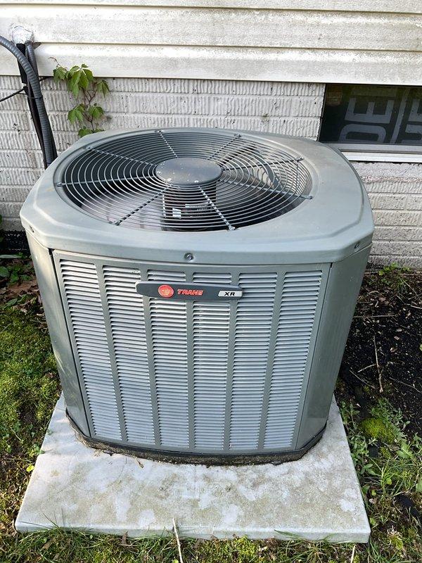 Completed scheduled AC tune-up on 10-year-old Trane XL16i condenser unit. Performed comprehensive preventive maintenance inspection including checking refrigerant levels, cleaning condenser coils, testing electrical connections, verifying proper fan operation, and ensuring optimal system performance. Unit operating within manufacturer specifications with no issues identified.