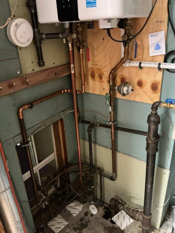 Performed annual descaling maintenance on a two-year-old tankless water heater system. Flushed unit with descaling solution to remove mineral buildup and maintain optimal heat exchanger efficiency, ensuring continued reliable hot water delivery and extending equipment lifespan.