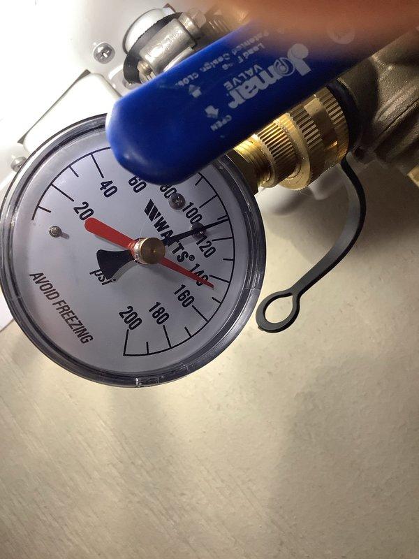 Performed descaling maintenance service on tankless water heater unit located in utility closet. Flushed system using descaling solution to remove mineral buildup and restore optimal heat exchanger efficiency. Verified proper system pressure and operation upon completion.