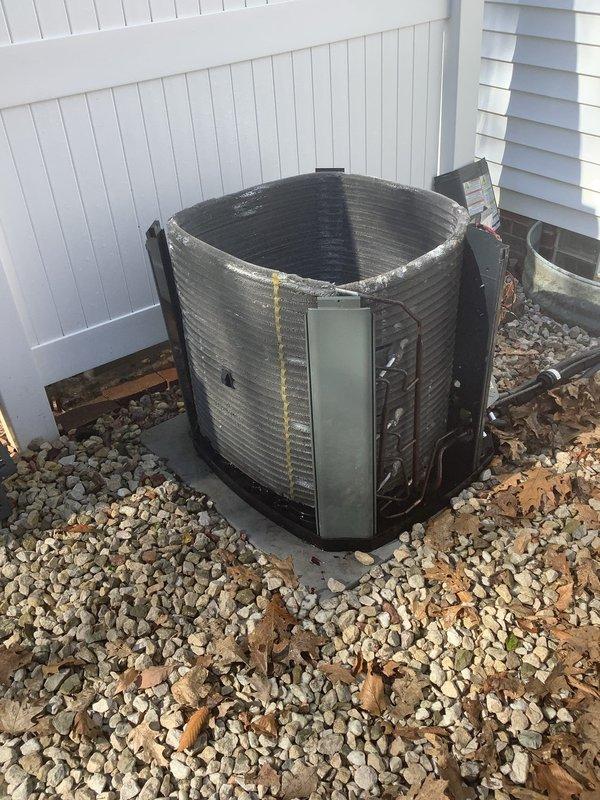 Completed scheduled BS-MVP cooling maintenance visit on 10-year-old residential air conditioning system. Performed comprehensive inspection of outdoor condensing unit, verified proper airflow through louvered panels, checked refrigerant levels, and confirmed fan assembly operation. Unit found in satisfactory operating condition with normal wear consistent with age. Cleared debris from gravel pad surrounding equipment and documented system condition with photographs for service records.