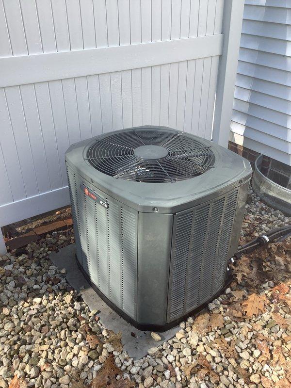 Completed scheduled BS-MVP cooling maintenance visit on 10-year-old residential air conditioning system. Performed comprehensive inspection of outdoor condensing unit, verified proper airflow through louvered panels, checked refrigerant levels, and confirmed fan assembly operation. Unit found in satisfactory operating condition with normal wear consistent with age. Cleared debris from gravel pad surrounding equipment and documented system condition with photographs for service records.