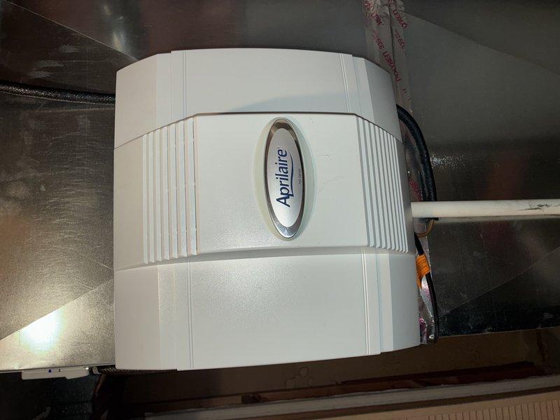 Completed scheduled heating maintenance visit on 6-year-old HVAC system. Inspected and serviced furnace components, verified proper operation of Aprilaire humidifier unit mounted in ductwork system, and replaced air filter showing signs of dust accumulation. All equipment operating within normal parameters upon completion.
