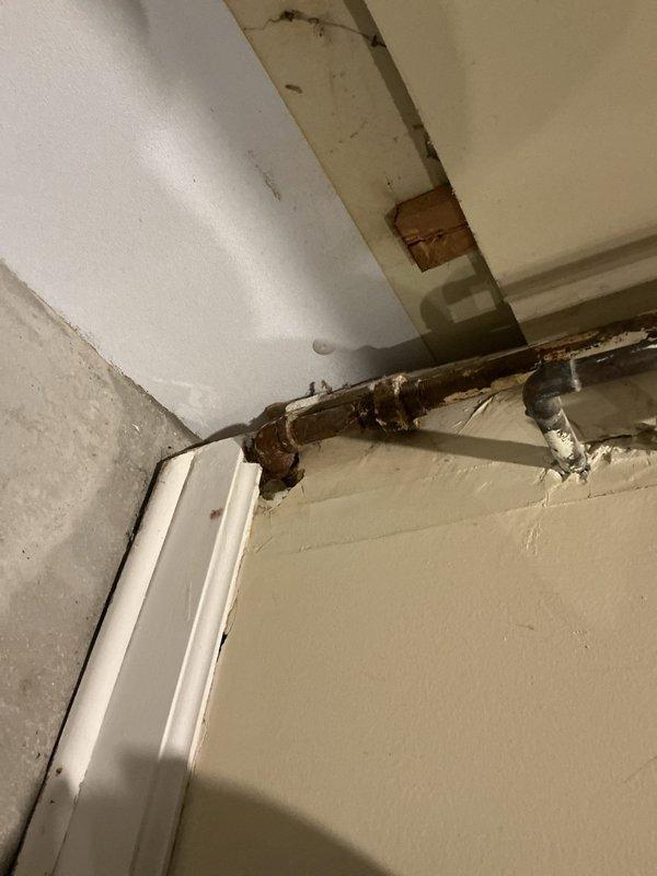 Responded to service call for inoperable gas fireplace with seized shut-off valve on connecting gas line. Upon inspection, found severely corroded metal gas pipe with extensive rust throughout, rendering the shut-off valve immobile and creating a potential safety hazard. Documented the deteriorated condition of the existing gas line and provided customer with a comprehensive quote for complete gas line replacement due to advanced corrosion and compromised integrity of the current installation.