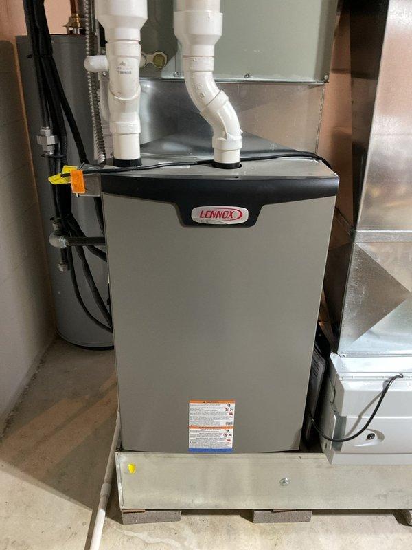 Completed routine cooling maintenance visit on 12-year-old Lennox HVAC system. Performed comprehensive inspection of indoor air handler unit and outdoor condensing unit, verified proper operation of all components including electrical connections, capacitor, and refrigerant lines. Observed significant corrosion on outdoor condensate reservoir requiring monitoring, confirmed all PVC drain lines flowing properly and system operating within normal parameters.