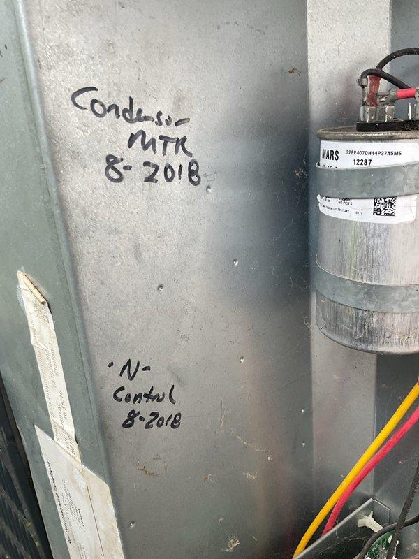 Completed BS-MVP cooling maintenance visit on 13-year-old air conditioning system. Performed standard system inspection, documented condenser motor and control components with dates marked from previous service in August 2018, verified MARS capacitor operation and electrical connections, and inspected outdoor disconnect box to ensure proper function of all safety controls and circuit protection devices.