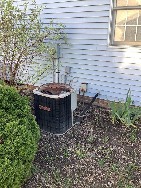 Completed full HVAC system installation including a 90% efficiency furnace and air conditioning unit. The vertical furnace was installed in the basement mechanical room with proper ductwork connections to the existing plenum system, while the outdoor condensing unit was positioned on the exterior of the home with appropriate refrigerant line connections and electrical conduit routing. All equipment was installed to manufacturer specifications, tested for proper operation, and left in fully functional condition.