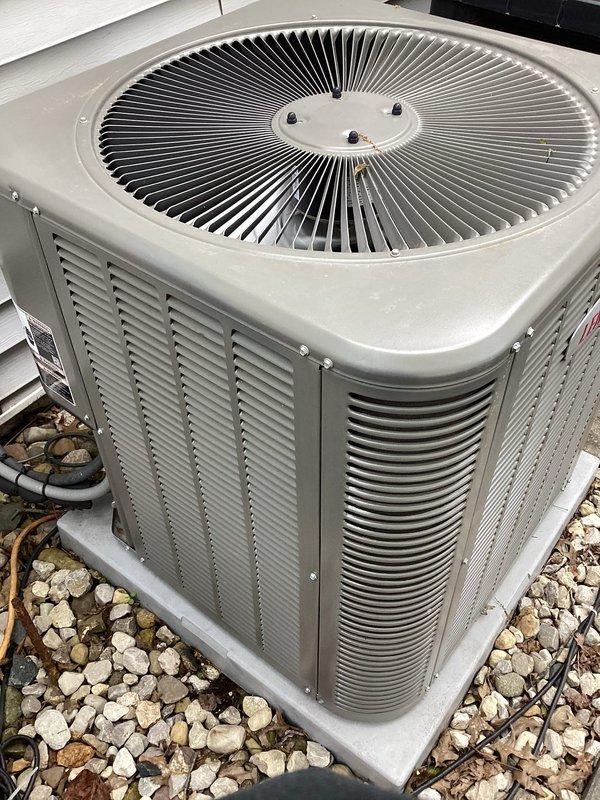 Completed MVP cooling maintenance visit on 3-year-old system. Inspected outdoor condenser unit, verified proper operation of fan assembly and refrigerant lines, checked indoor air filter condition and noted rust staining on metal panel indicating possible moisture exposure. Unit operational with follow-up scheduled.