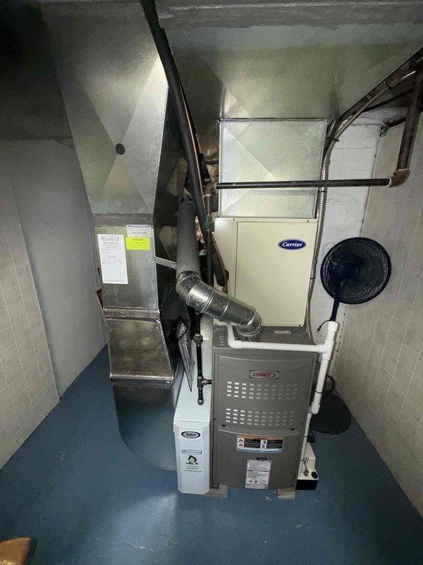 Completed comprehensive furnace tune-up and heating system maintenance on residential HVAC installation. Performed thorough inspection of furnace unit, Carrier air handler, and associated ductwork components. Examined blower wheel assembly, confirming proper blade condition and clearances, with all components operating within manufacturer specifications.