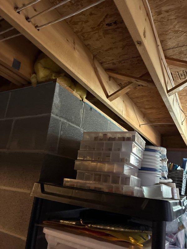 Installed four customer-provided recessed can lights and one customer-provided ceiling fan in covered patio area with exposed ceiling joists. Completed all electrical connections, secured fixtures to structural framing, and verified proper operation of all lighting and fan controls.