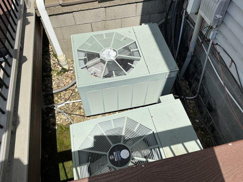Provided estimate for complete HVAC system replacement including two furnaces and two air conditioning heat pump units. Existing equipment is 24 years old but currently operational. Customer requested Carrier brand equipment and confirmed availability during midday hours for future installation scheduling.