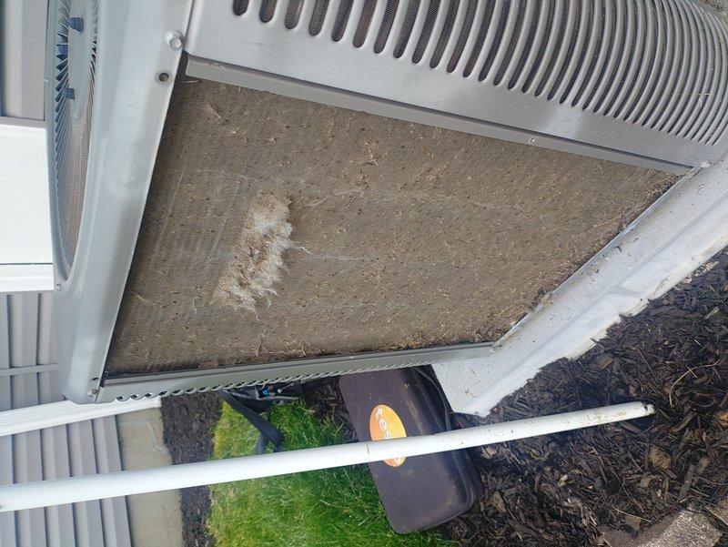 Completed scheduled air conditioning tune-up and system inspection. Upon accessing the indoor air handler unit in the attic, discovered significant ice buildup on the refrigerant suction line, indicating a cooling system malfunction likely caused by restricted airflow or low refrigerant charge. Performed comprehensive diagnostics including filter inspection, airflow verification, and refrigerant pressure testing. Inspected outdoor condensing unit, confirmed proper operation of condenser fan and compressor, and cleared debris from surrounding area. Addressed the frozen evaporator coil issue, allowed system to thaw, and verified proper system operation before departure. Provided complimentary carbon monoxide detector as part of promotional service package.