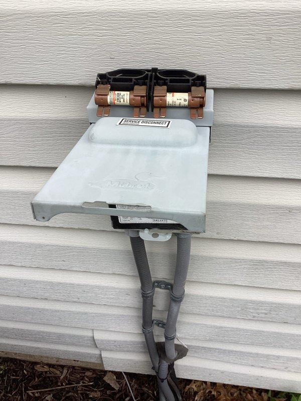 Completed BS-MVP cooling maintenance visit on 8-year-old system. Performed standard seasonal inspection of outdoor unit, including visual assessment of electrical components, capacitor, contactor, and wiring connections. Verified proper operation of service disconnect and fuse assembly. System components found in good working condition with no immediate repairs required during this visit.