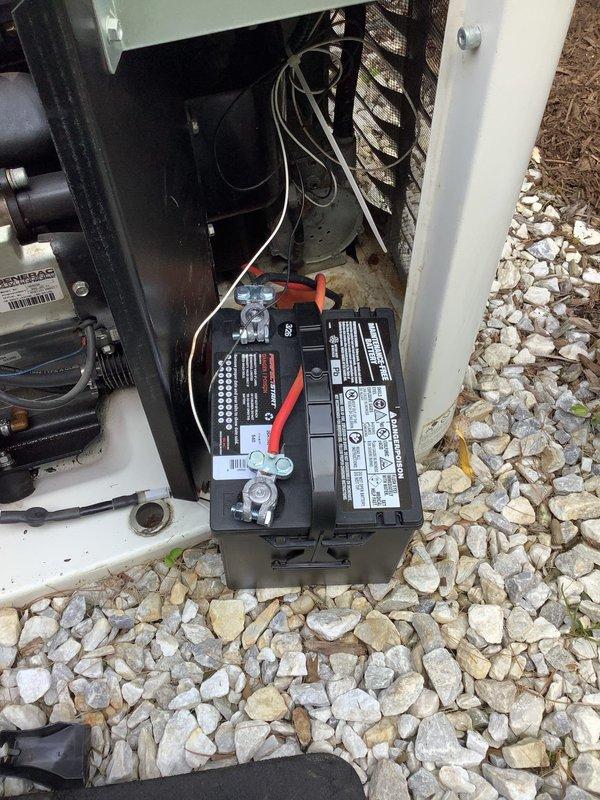 Replaced failed battery and corroded terminal connectors on residential Generac backup generator unit. Removed old battery dated from 2022, installed new replacement battery, and fitted fresh terminal connectors to ensure proper electrical contact and reliable starting capability. Verified all connections were secure and system was operational upon completion.
