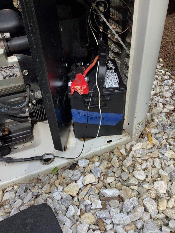 Replaced failed battery and corroded terminal connectors on residential Generac backup generator unit. Removed old battery dated from 2022, installed new replacement battery, and fitted fresh terminal connectors to ensure proper electrical contact and reliable starting capability. Verified all connections were secure and system was operational upon completion.