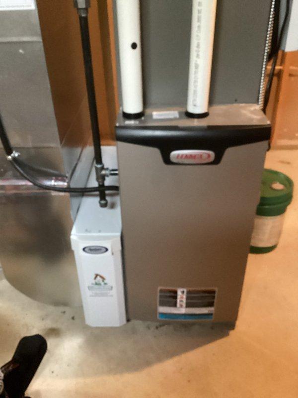 Completed comprehensive AC tune-up on 3-year-old residential cooling system. Performed standard maintenance protocol including inspection of indoor furnace components and outdoor condenser unit, noting significant dirt and debris accumulation on condenser coils that was affecting heat transfer efficiency. System operational and ready for cooling season.