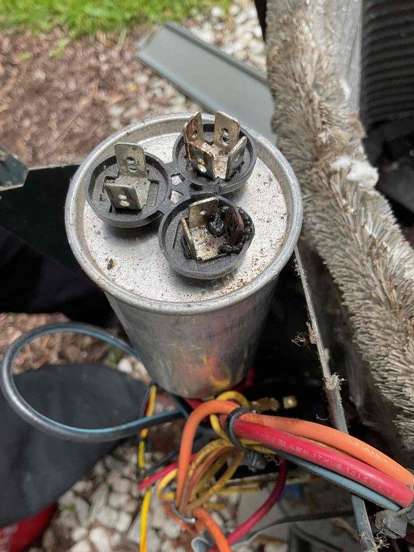 Completed preventive maintenance on 14-year-old air conditioning system under MVP recurring service agreement. Performed standard cooling season maintenance including inspection of dual-run capacitor, which showed signs of terminal corrosion and discoloration requiring monitoring. Evaluated electrical connections, condenser coil condition with noted debris accumulation, and refrigerant line insulation. All system components operational at time of service completion.