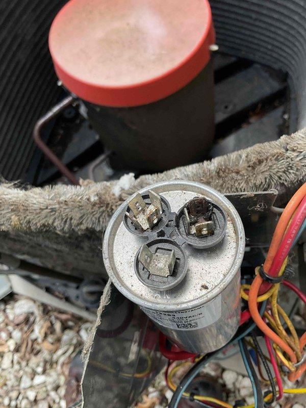 Completed preventive maintenance on 14-year-old air conditioning system under MVP recurring service agreement. Performed standard cooling season maintenance including inspection of dual-run capacitor, which showed signs of terminal corrosion and discoloration requiring monitoring. Evaluated electrical connections, condenser coil condition with noted debris accumulation, and refrigerant line insulation. All system components operational at time of service completion.