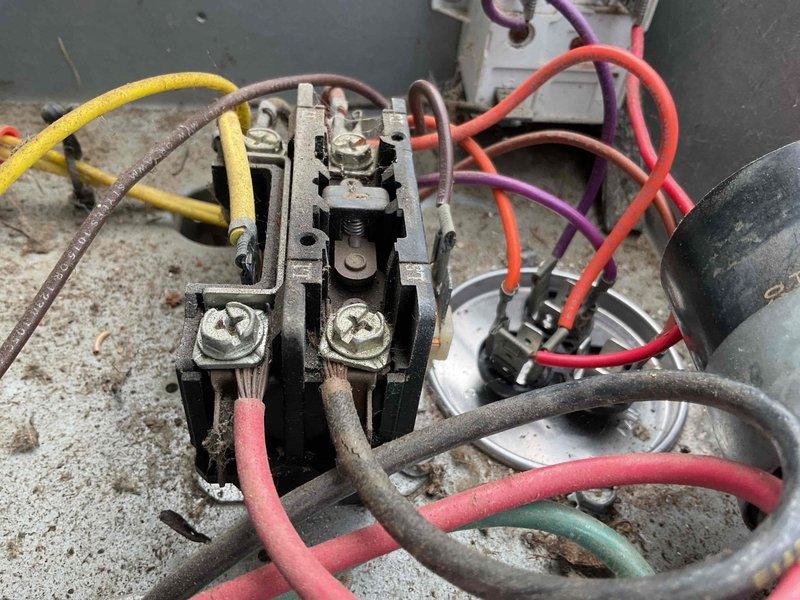 Completed scheduled cooling maintenance visit on 20-year-old air conditioning system. Performed comprehensive inspection of outdoor condensing unit, including electrical connections, contactor, capacitor, and compressor terminals. All wire connections were verified secure at contactor and capacitor terminal blocks. Documented equipment condition with photos showing normal wear consistent with age of system. Unit operational at time of service.