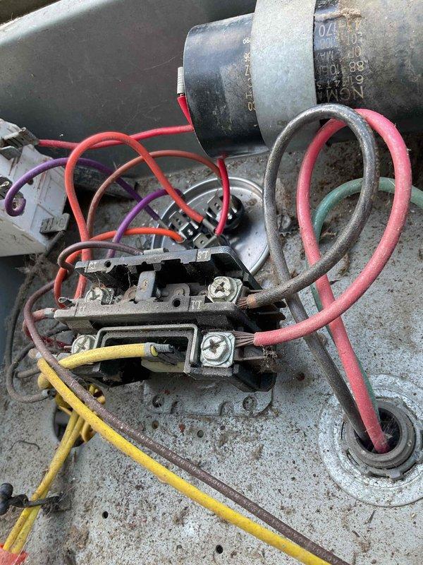 Completed scheduled cooling maintenance visit on 20-year-old air conditioning system. Performed comprehensive inspection of outdoor condensing unit, including electrical connections, contactor, capacitor, and compressor terminals. All wire connections were verified secure at contactor and capacitor terminal blocks. Documented equipment condition with photos showing normal wear consistent with age of system. Unit operational at time of service.